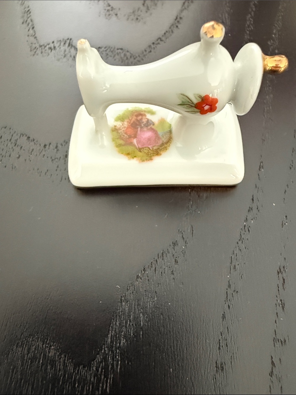 Vintage Limoges miniature sewing machine. White with gold trim. Made in France
